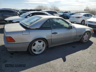 1992 Mercedes-Benz 500 z VIN WDBFA66E3NF060502, wystawiony jako Copart lot #50443615 z przebiegiem 99 956 mil mil oraz Czysty tytuł • Clean title. Historia ofert i sprzedaży dostępna na DreamBid. Obrazek 3.