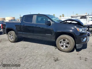 2019 Chevrolet Colorado 4WD Z71 with VIN 1GCGTDEN2K1110966, listed as a Copart auction lot 46719435 with 49,948 mi miles and Salvage Title. Bid and sale history available at carsss.com. Image 4.