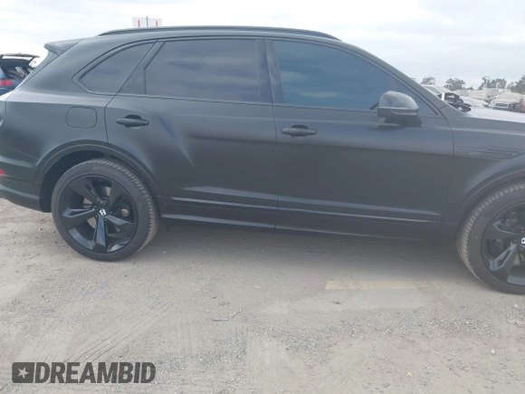 2021 Bentley Bentayga V8 z VIN SJAAM2ZV5MC038171, wystawiony jako IAAI lot #42057762 z przebiegiem 25 973 mil mil oraz . Historia ofert i sprzedaży dostępna na DreamBid. Obrazek 13.