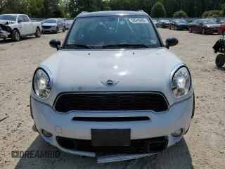 2014 MINI Countryman S with VIN WMWZC5C5XEWP37128, listed as a Copart auction lot 59549885 with 84,121 mi miles and Salvage title. Bid and sale history available at DreamBid. Image 5.