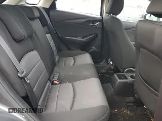 2016 Mazda CX-3 Sport z VIN JM1DKFB72G0138206, wystawiony jako Copart lot #52023695 z przebiegiem 101 734 mil mil oraz Szkody całkowita. Historia ofert i sprzedaży dostępna na DreamBid. Obrazek 11.