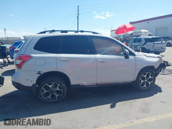 2016 Subaru Forester XT Touring with VIN JF2SJGXC5GH456474, listed as a IAAI auction lot 42320208 with 114,524 mi miles and . Bid and sale history available at DreamBid. Image 13.