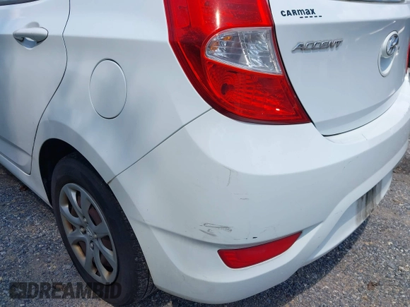 2012 Hyundai Accent GS z VIN KMHCT5AE4CU016044, wystawiony jako IAAI lot #42803906 z przebiegiem 168 824 mil mil oraz . Historia ofert i sprzedaży dostępna na DreamBid. Obrazek 16.