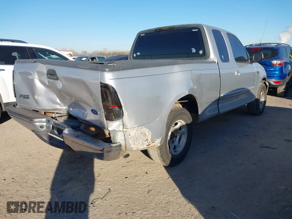 1999 Ford F-150 with VIN 1FTZX1729XKA58767, listed as a IAAI auction lot 41392815 with 342,029 mi miles and . Bid and sale history available at DreamBid. Image 4.
