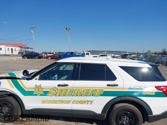 2022 Ford Police Interceptor Utility z VIN 1FM5K8AB2NGA02664, wystawiony jako IAAI lot #40499840 z przebiegiem 7 067 mil mil oraz . Historia ofert i sprzedaży dostępna na DreamBid. Obrazek 14.