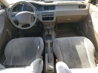 1995 Honda Civic DX z VIN 1HGEG8646SL023702, wystawiony jako Copart lot #82193694 z przebiegiem 213 950 mil mil oraz Szkoda całkowita • Salvage title. Historia ofert i sprzedaży dostępna na DreamBid. Obrazek 8.