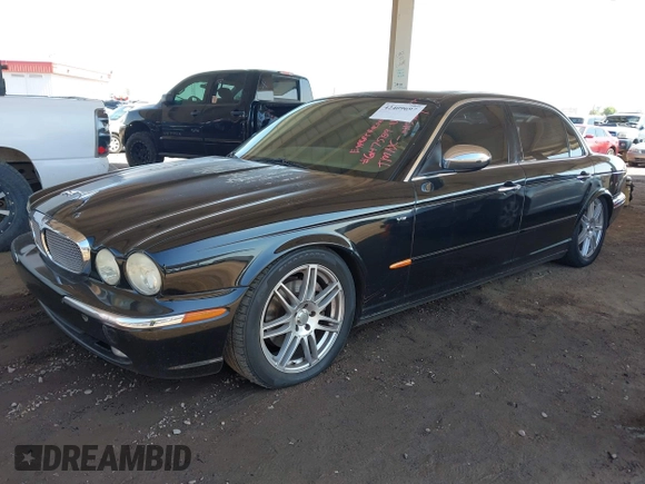 2005 Jaguar XJ Vanden Plas z VIN SAJWA82C05SG47589, wystawiony jako IAAI lot #42409697 z przebiegiem 222 598 mil mil oraz . Historia ofert i sprzedaży dostępna na DreamBid. Obrazek 17.