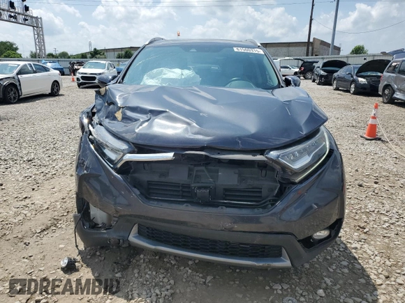 2018 Honda CR-V Touring with VIN 2HKRW2H9XJH605264, listed as a Copart auction lot 61500315 with 106,616 mi miles and Salvage title. Bid and sale history available at DreamBid. Image 5.