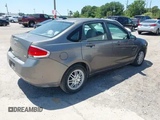 2011 Ford Focus SE with VIN 1FAHP3FN4BW174842, listed as a IAAI auction lot 42027681 with 58,616 mi miles. Bid and sale history available at carsss.com. Image 4.