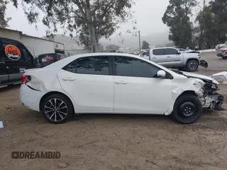 2019 Toyota Corolla L with VIN 5YFBURHE3KP895705, listed as a IAAI auction lot 42034995 with 173,719 mi miles and . Bid and sale history available at DreamBid. Image 14.