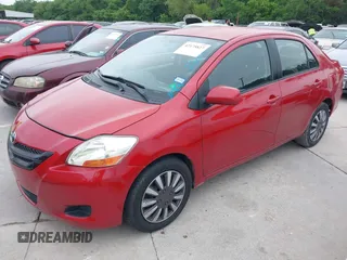 2007 Toyota Yaris with VIN JTDBT903071077664, listed as a IAAI auction lot 42175827 with 154,079 mi miles. Bid and sale history available at carsss.com. Image 2.