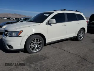 2013 Dodge Journey R/T with VIN 3C4PDCEG3DT659001, listed as a Copart auction lot 78187554 with 128,052 mi miles and Salvage title. Bid and sale history available at DreamBid. Image 1.