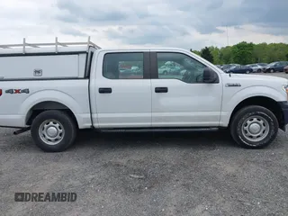 2019 Ford F-150 XL with VIN 1FTEW1EB0KFB01334, listed as a IAAI auction lot 42090740 with 79,881 mi miles and . Bid and sale history available at DreamBid. Image 13.