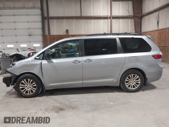 2016 Toyota Sienna XLE with VIN 5TDYK3DC7GS748075, listed as a IAAI auction lot 41795318 with 153,913 mi miles. Bid and sale history available at carsss.com. Image 15.