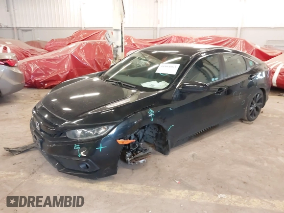 2019 Honda Civic Sport with VIN 19XFC2F89KE206213, listed as a IAAI auction lot 41804863 with 76,052 mi miles and . Bid and sale history available at DreamBid. Image 23.