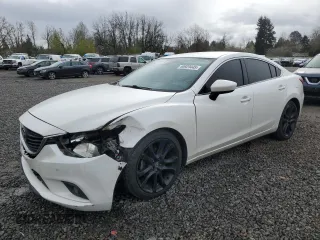 2014 Mazda Mazda6 i Touring with VIN JM1GJ1T69E1114677, listed as a Copart auction lot 50929445 with 237,700 mi miles and Salvage Title. Bid and sale history available at carsss.com. Image 1.
