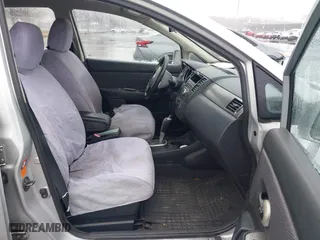 2009 Nissan Versa 1.8 SL with VIN 3N1BC13E59L420840, listed as a IAAI auction lot 41503232 with 129,824 mi miles. Bid and sale history available at carsss.com. Image 5.