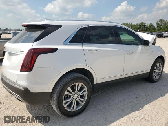2023 Cadillac XT5 FWD Premium Luxury with VIN 1GYKNCRS7PZ150378, listed as a Copart auction lot 71792184 with 21,631 mi miles and Salvage Title. Bid and sale history available at carsss.com. Image 3.