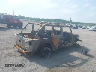 2013 Jeep Wrangler Unlimited Sahara with VIN 1C4BJWEG6DL551696, listed as a IAAI auction lot 42171223 with 164,927 mi miles and . Bid and sale history available at DreamBid. Image 4.