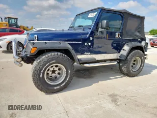 2006 Jeep Wrangler X z VIN 1J4FA39S66P775734, wystawiony jako Copart lot #59903755 z przebiegiem 145 041 mil mil oraz Czysty tytuł • Clean title. Historia ofert i sprzedaży dostępna na DreamBid. Obrazek 1.