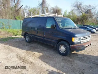 2002 Ford Econoline Cargo with VIN 1FTRE142X2HA67221, listed as a IAAI auction lot 42079493 with 180,324 mi miles. Bid and sale history available at carsss.com. Image 1.