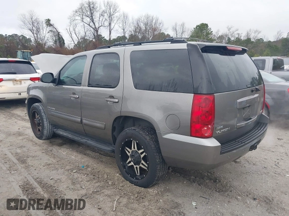 2007 GMC Yukon SLT with VIN 1GKFK13047R288220, listed as a IAAI auction lot 41579399 with 215,464 mi miles. Bid and sale history available at carsss.com. Image 3.