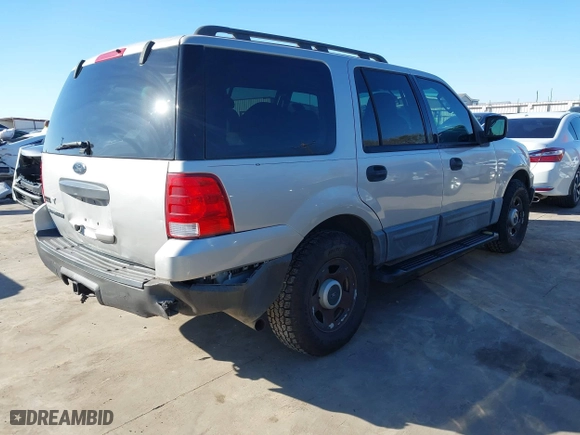 2004 Ford Expedition XLS with VIN 1FMRU13W64LB51765, listed as a IAAI auction lot 41760670 with 84,333 mi miles. Bid and sale history available at carsss.com. Image 4.