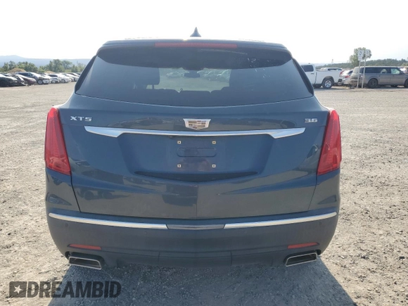 2019 Cadillac XT5 Premium Luxury FWD with VIN 1GYKNERS8KZ214013, listed as a Copart auction lot 59239635 with 82,862 mi miles and Salvage title. Bid and sale history available at DreamBid. Image 6.