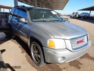 2004 GMC Envoy SLE with VIN 1GKDS13S542128604, listed as a IAAI auction lot 41653776 with 190,352 mi miles. Bid and sale history available at carsss.com. Image 1.