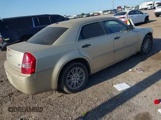 2010 Chrysler 300 Touring with VIN 2C3CA5CV0AH167992, listed as a IAAI auction lot 41985352 with 235,816 mi miles. Bid and sale history available at carsss.com. Image 4.