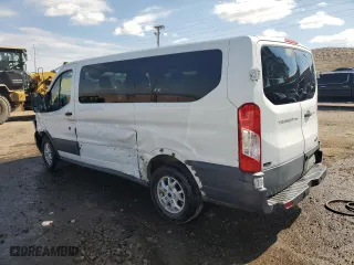 2015 Ford Transit Wagon XL with VIN 1FMZK1YM9FKA84956, listed as a Copart auction lot 70042594 with 73,226 mi miles and Salvage Title. Bid and sale history available at carsss.com. Image 2.