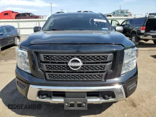 2024 Nissan Titan SV with VIN 1N6AA1EC2RN101063, listed as a Copart auction lot 49879235 with 12,418 mi miles and Salvage title. Bid and sale history available at DreamBid. Image 5.