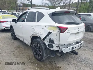 2016 Mazda CX-5 Grand Touring with VIN JM3KE2DY6G0622030, listed as a IAAI auction lot 41943466 with 110,283 mi miles. Bid and sale history available at carsss.com. Image 3.