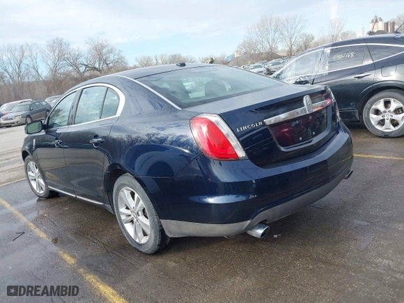 2009 Lincoln MKS with VIN 1LNHM93R39G619004, listed as a IAAI auction lot 41834480 with 184,817 mi miles. Bid and sale history available at carsss.com. Image 3.