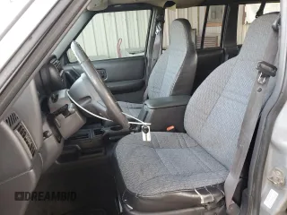 2000 Jeep Cherokee with VIN 1J4FF48S7YL221475, listed as a Copart auction lot 53005275 with 273,246 mi miles and Clean title. Bid and sale history available at DreamBid. Image 7.
