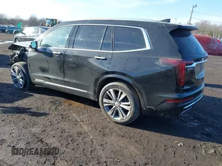 2023 Cadillac XT6 FWD Premium Luxury with VIN 1GYKPCRS1PZ105964, listed as a IAAI auction lot 41525039 with 70,603 mi miles and . Bid and sale history available at DreamBid. Image 3.