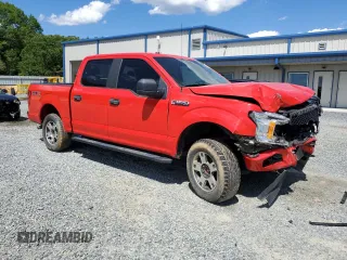 2019 Ford F-150 XL with VIN 1FTEW1E43KKE28982, listed as a Copart auction lot 58302285 with 101,707 mi miles and Salvage title. Bid and sale history available at DreamBid. Image 4.
