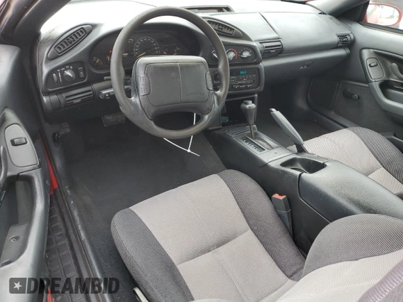 1995 Chevrolet Camaro z VIN 2G1FP22S1S2181409, wystawiony jako Copart lot #49273555 z przebiegiem 112 589 mil mil oraz Czysty tytuł • Clean title. Historia ofert i sprzedaży dostępna na DreamBid. Obrazek 8.