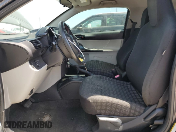 2012 Scion iQ with VIN JTNJJXB06CJ011117, listed as a Copart auction lot 52694345 with 94,547 mi miles and Salvage Title. Bid and sale history available at carsss.com. Image 7.
