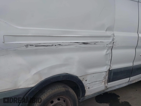 2016 Ford Transit Cargo with VIN 1FTYE9ZM9GKA01015, listed as a IAAI auction lot 42533387 with 186,555 mi miles and . Bid and sale history available at DreamBid. Image 6.