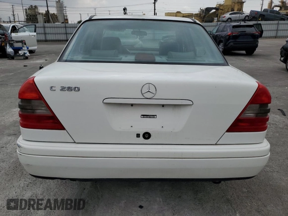 1997 Mercedes-Benz C with VIN WDBHA28E3VF582237, listed as a Copart auction lot 76826534 with 240,702 mi miles and Clean Title. Bid and sale history available at carsss.com. Image 6.