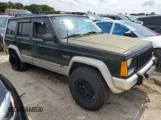 1995 Jeep Cherokee Country with VIN 1J4FJ78S4SL631318, listed as a Copart auction lot 63087634 with 295,577 mi miles and Salvage Title. Bid and sale history available at carsss.com. Image 4.