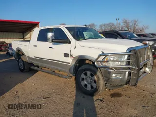 2014 Ram 2500 Longhorn with VIN 3C6UR5PL7EG191298, listed as a IAAI auction lot 40978191 with 156,686 mi miles. Bid and sale history available at carsss.com. Image 1.