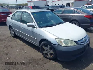 2004 Honda Civic EX with VIN 2HGES26804H574321, listed as a IAAI auction lot 42031025 with 202,185 mi miles. Bid and sale history available at carsss.com. Image 1.