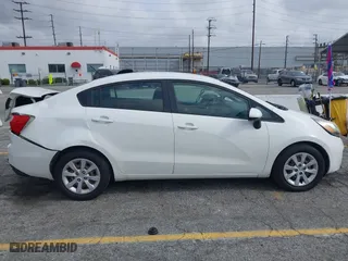 2012 Kia Rio LX with VIN KNADM4A31C6089842, listed as a IAAI auction lot 41928559 with 129,030 mi miles. Bid and sale history available at carsss.com. Image 12.