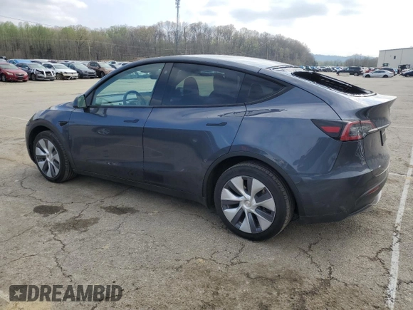 2023 Tesla Model Y Long Range with VIN 7SAYGDEE2PA024693, listed as a Copart auction lot 52595935 with 35,179 mi miles and Salvage Title. Bid and sale history available at DreamBid. Image 2.