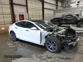 2022 Tesla Model S with VIN 5YJSA1E59NF469984, listed as a IAAI auction lot 42426490 with Not provided miles and . Bid and sale history available at DreamBid. Image 1.