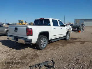 2017 GMC Sierra 1500 SLT z VIN 3GTU2NEC0HG304187, wystawiony jako IAAI lot #41973007 z przebiegiem Nie podano mil oraz . Historia ofert i sprzedaży dostępna na DreamBid. Obrazek 4.