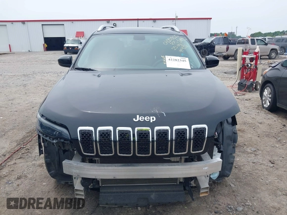 2020 Jeep Cherokee Latitude with VIN 1C4PJLCB5LD539057, listed as a IAAI auction lot 42282345 with 68,676 mi miles and . Bid and sale history available at DreamBid. Image 13.
