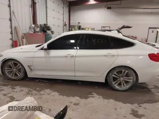 2016 BMW 3 Series GT 328i xDrive with VIN WBA8Z5C54GG500965, listed as a IAAI auction lot 41254000 with 115,672 mi miles. Bid and sale history available at carsss.com. Image 14.